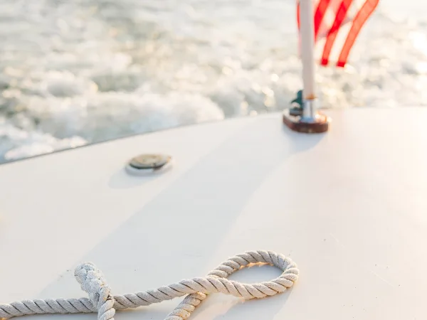 Bachelorette party group toasting champagne on a Maine boat cruise