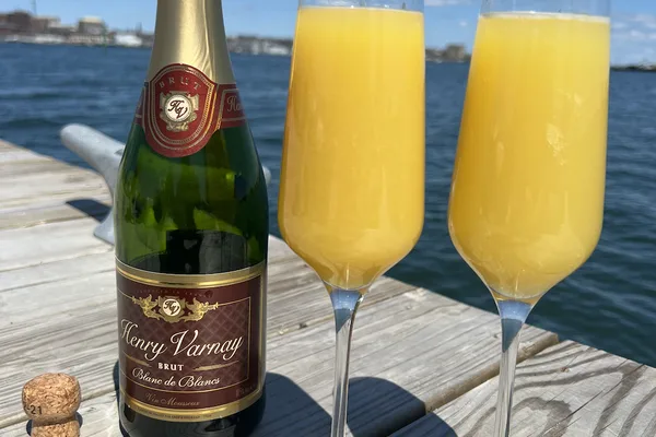 Bottomless mimosa and croissant brunch bachelorette boat cruise Portland Maine